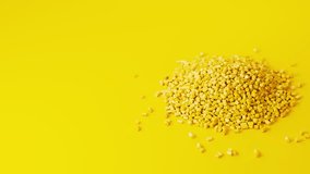 Yellow plastic polypropylene granules pouring from cup on a pile of granules, masterbatch polymer grain on yellow backdrop. HDPE or PVC resin pellets. 3d render animation. 3D Illustration - Powered by Shutterstock - Get 15% off with code: PIKWIZARD15