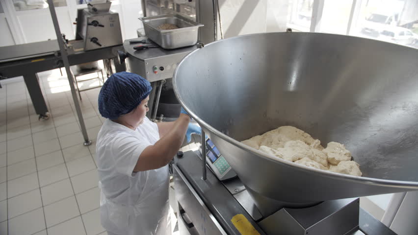 Industrial Bakery Dough Mixing. Bakery and flour production.