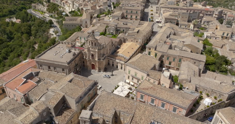 Aerial view of the Church of San Giuseppe, located in the historic center of Ragusa Ibla, Sicily, Italy. It is a Baroque-style Catholic church located along the main street of the old town.