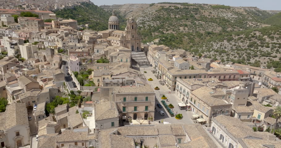 Aerial view of the Cathedral of San Giorgio, located in the historic center of the old town of Ragusa Ibla, Sicily, Italy. Example of Baroque architecture, it features a wide staircase at its entrance