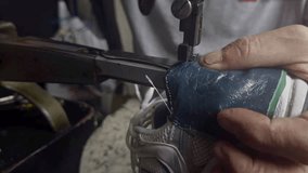 Hand Cobbler Shoe Repair Sewing Machine Leather Cloth Cotton Nylon Thread Footage.   - Powered by Shutterstock - Get 15% off with code: PIKWIZARD15
