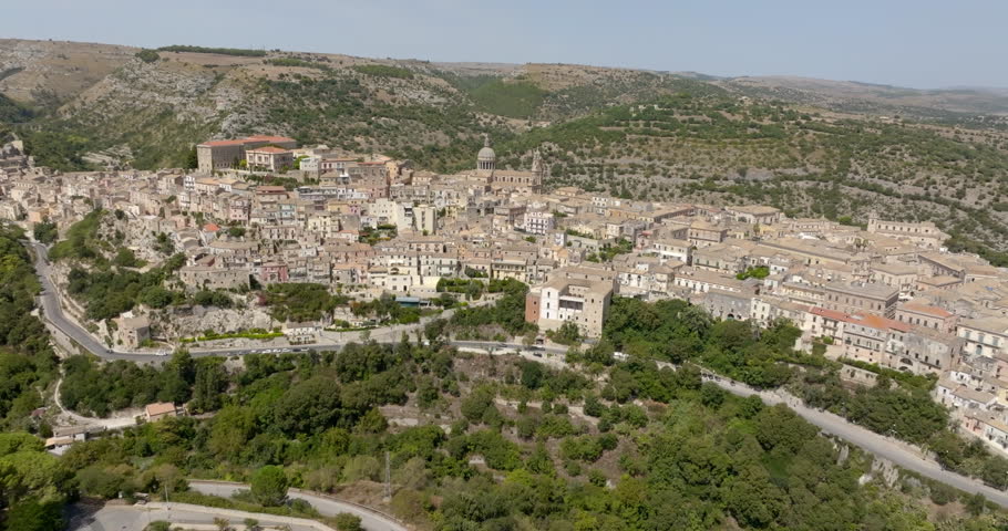 Zoom on the dome and side of the Cathedral of San Giorgio, located in the historic center of the old town of Ragusa Ibla, Sicily, Italy. It is an example of Sicilian Baroque architecture.