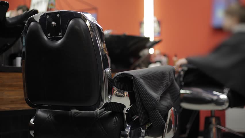 Retro hairdresser Barber armchair for man on background barbershop.