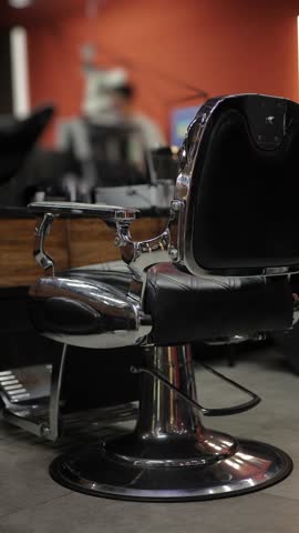 Retro Barber armchair for man in barbershop.