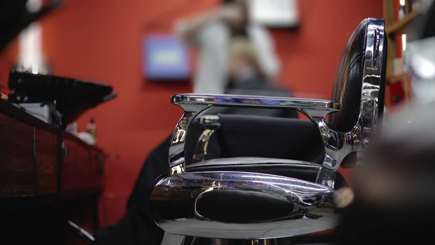 Retro hairdresser Barber armchair for man on background barbershop.