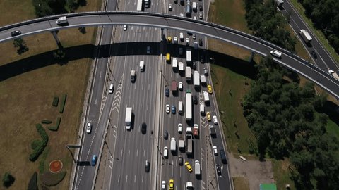 Aerial View Heavy Highway Traffic Beneath Curved