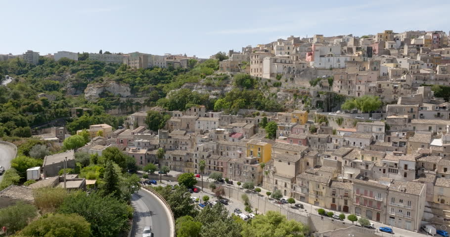 Aerial view of the roofs, houses and apartments, ideal for the concept of an Italian hilltop village nestled among the mountains. This is the historic center of Ragusa Ibla, Sicily, Italy.