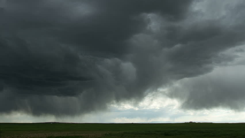 Large thunderstorm moves over the eastern plains of Colorado, on the same day