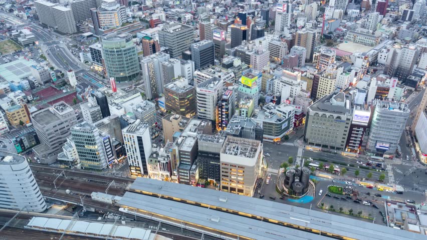 Time lapse of an urban landscape with railroads and roads