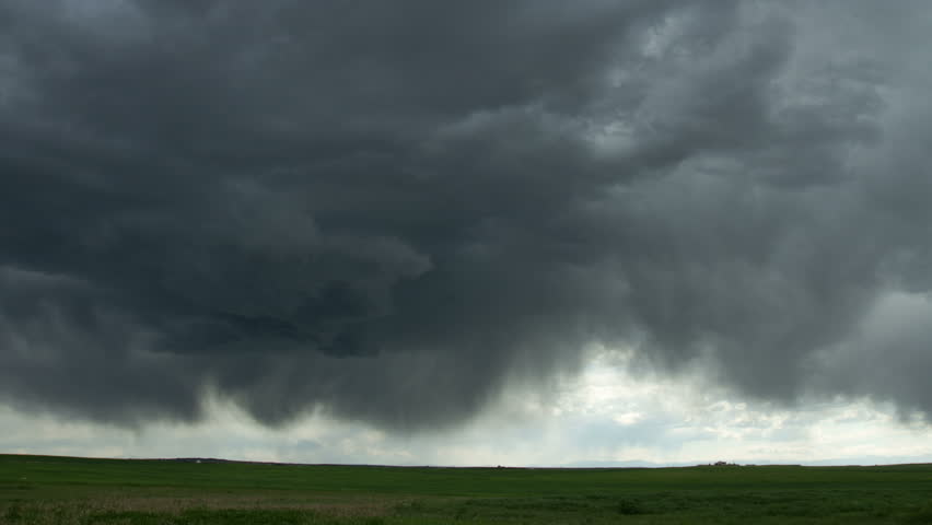 Large thunderstorm moves over the eastern plains of Colorado, on the same day
