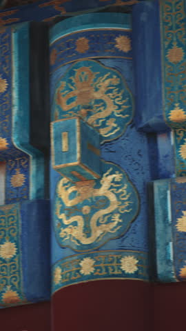 Beijing, China famous landmark Temple of Heaven. Intricate blue and gold designs adorn a traditional structure, showcasing artistic craftsmanship.