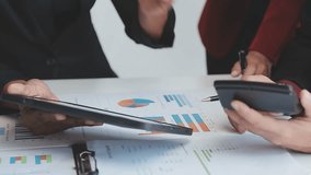 Tablet screen, hands and business people in meeting with graphs, investment or stock market. Laptop, team and women planning with chart for financial trading, scroll or performance analysis in office - Powered by Shutterstock - Get 15% off with code: PIKWIZARD15