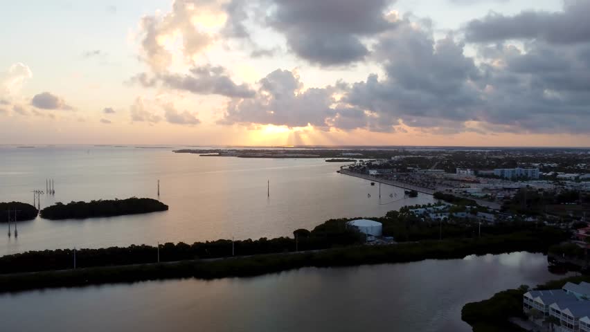 Aerial sunrise over the Salt Pond Keys near Dredgers Key and Sigsbee Road in Key West, Florida, capturing early-morning light reflecting across calm coastal waters