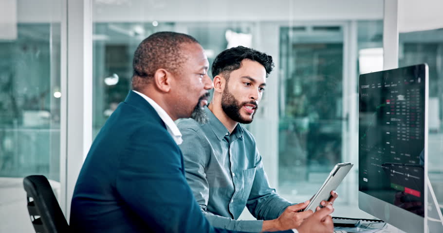 Trading, men and computer with tablet discussion for market trends, stock price or data analysis. Trader dashboard, teamwork and graph screen in office for investment advice, economy news or feedback