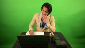 Suited Businessman Handles Two Landlines with Ease, Office Worker Multitasks Phone Calls and Notes, Corporate Professional Balances Talk Plus Writing, Busy Employee manages Dual Receivers in Workspace - Powered by Shutterstock - Get 15% off with code: PIKWIZARD15