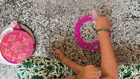 closeup of rangoli artwork being crafted for festival - Powered by Shutterstock - Get 15% off with code: PIKWIZARD15