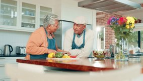 Elderly couple, cooking and cut vegetables in kitchen for healthy diet, nutrition or salad in home. Senior man, happy woman and chopping board for meal prep, organic ingredients or talk in retirement - Powered by Shutterstock - Get 15% off with code: PIKWIZARD15