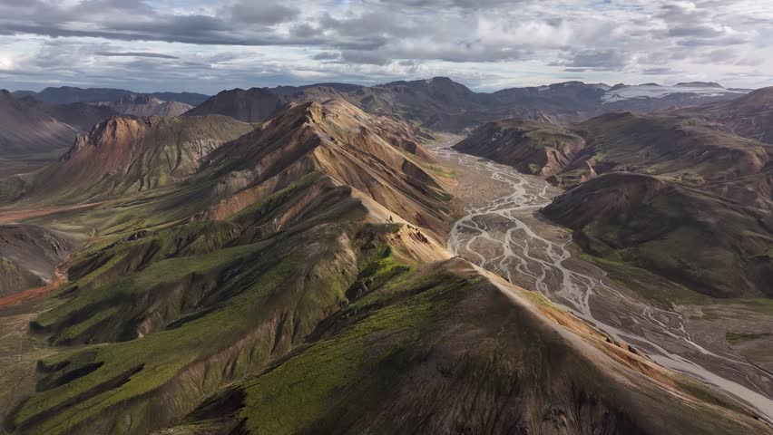 Aerial wide shot of Landmannalaugar rhyolite mountain with glacial rivers in Iceland. Panorama view.