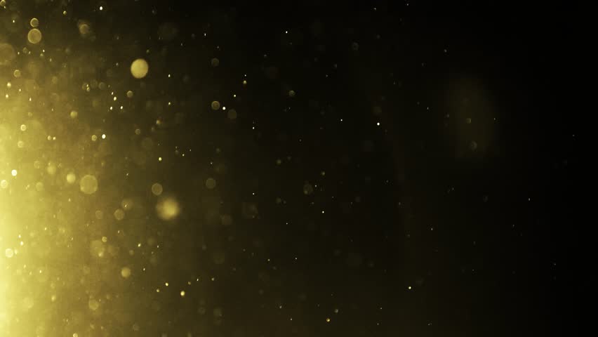 Golden particles moving in slow motion on black background 4k footage, Gold litters footage, particles moving footage, gold glitters footage, particles explosion. Animation video transparent backgroun