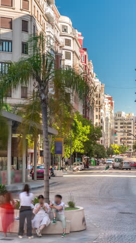 Traffic passes near a bus stop close to Valencia Central Market on avenue de l