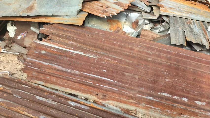 piles of penny sheet rubbish in the yard
