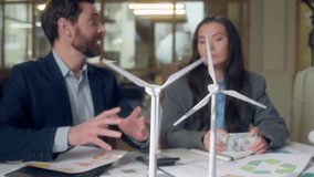 Recycling deal handshake gesture graph analyzing calculating price eco investment Korean woman paying money budget Caucasian business man renewable windmills agreement finance sustainable profit team - Powered by Shutterstock - Get 15% off with code: PIKWIZARD15