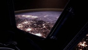 ISS Window View of Glowing Earth City Lights During Night Orbit, Elements of this Video Furnished by NASA - 4K - Powered by Shutterstock - Get 15% off with code: PIKWIZARD15