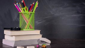 Happy Teachers' Day (24 November) motion graphic on a blackboard background with school supplies, books, and pencils. Celebration for educators in Turkey. - Powered by Shutterstock - Get 15% off with code: PIKWIZARD15