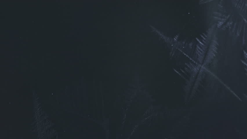 Real Timelapse Shot of Frost Texture Forming on Glass