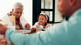 Grandparents, child and eating lunch for thanksgiving celebration, meal and serving burger. Girl, grandmother and grandfather share food in home, generations and happy family talking in dining room - Powered by Shutterstock - Get 15% off with code: PIKWIZARD15