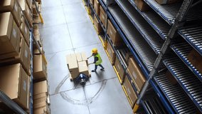 Aerial view of a warehouse worker wearing gloves and a face mask, organizing boxes during logistics operations, safety protocols, and storage management. - Powered by Shutterstock - Get 15% off with code: PIKWIZARD15