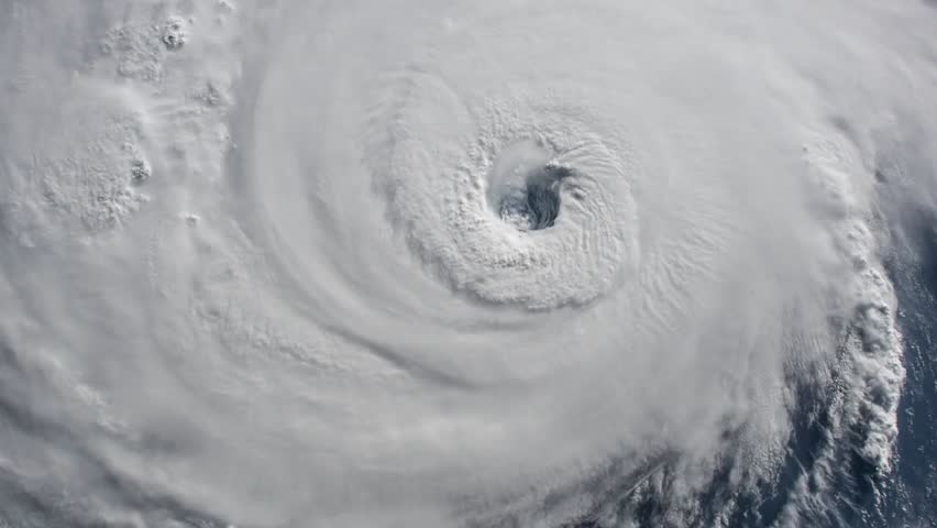 Animation of a massive hurricane from outer space, showing storm patterns and tornado activity, with NASA imagery highlighting extreme weather phenomena.