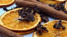 Herbal winter tea ingredients - cinnamon, anise, carnation and slices of dry citrus. Healthy seasonal beverage, close-up - Powered by Shutterstock - Get 15% off with code: PIKWIZARD15