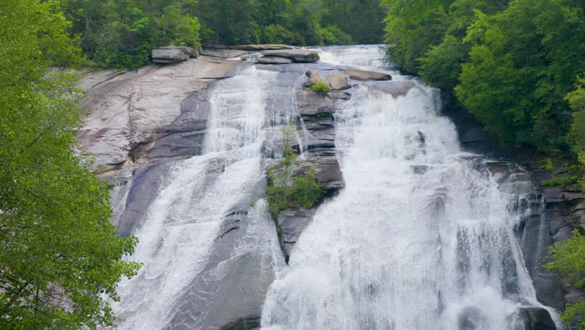 Beautiful Waterfall in Appalachian Mountains National Park North Carolina. Fall of Water Nature Wild. North Carolina Cascade Waterfall in Appalachian Mountains Surrounded by Green Forest.