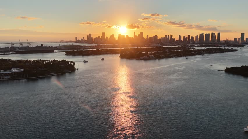 Sunset City At Miami Beach In Florida United States. Sunset Beach. Illuminated Cityscape. Downtown City. Sunset City At Miami Beach In Florida United States. Amazing Sunset Skyline.