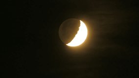 Glowing crescent moon illuminates the night sky, surrounded by wispy clouds, offering space for text or design elements - Powered by Shutterstock - Get 15% off with code: PIKWIZARD15