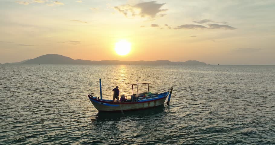 Fishing boats off the coast of Doc Let, Nha Trang, Vietnam at dawn. The main means of offshore fishing for fishermen in central Vietnam