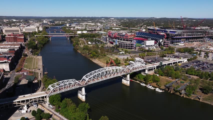 Orbiting Drone Shot AboveCumberland River Pedestrian Bridge. Nashville, Tennessee