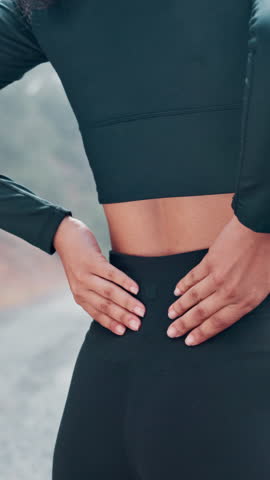 Fitness, back pain or hands outdoor with massage, training accident or emergency in muscle tension. Sports, hurt or woman outside with injury, spine stiffness and joint strain in workout issue.