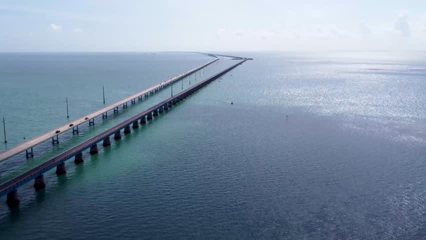 Key West Aerial drone view of long Seven Mile Bridge in the Florida Keys, capturing its full stretch across turquoise water from high above