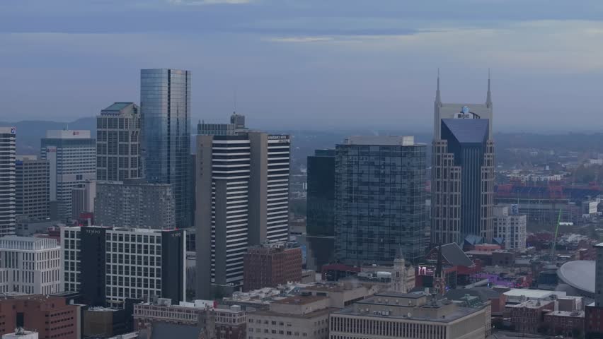 Nashville cityscape at dusk with skyline and urban buildings