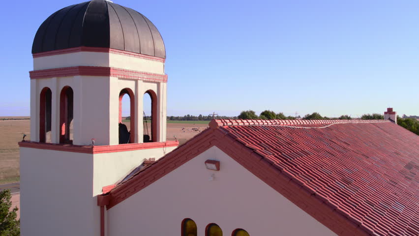 Small Church in Countryside Bell Tower and Graveyard