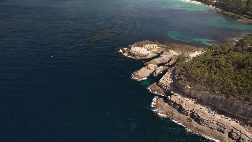 Rocky Coastline Of Pirates Bay Beach In Eaglehawk Neck, Tasmania, Australia - Drone Shot