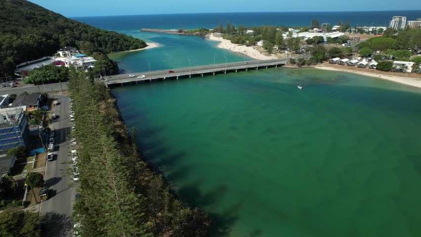 Bridge Over Tallebudgera Creek With Turquoise Water, Beaches, And Surrounding Suburbs In Gold Coast, Australia - Drone Shot