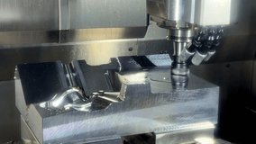 Spindle CNC Milling  machine during operation produced metal parts, industry heavy factory. - Powered by Shutterstock - Get 15% off with code: PIKWIZARD15