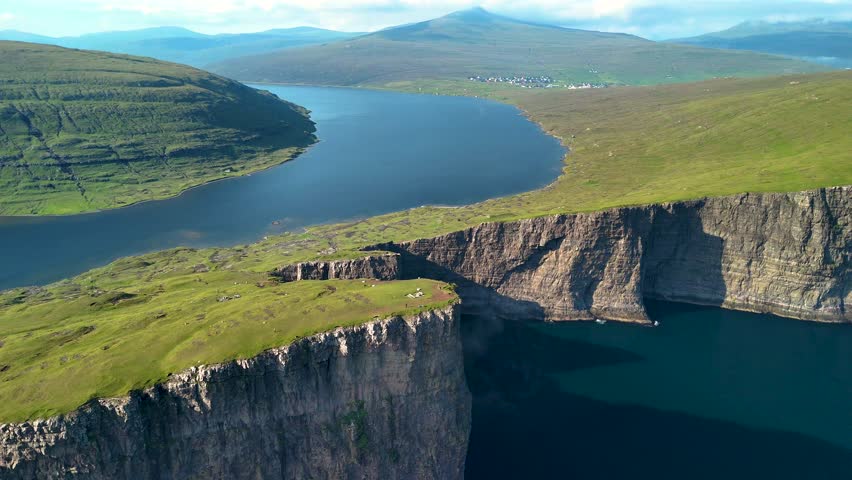 Discover the beauty of Lake Sorvagsvatn, perched dramatically above the ocean.