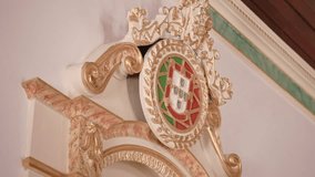 closeup of decorative portuguese crest in gold and marble accents - Powered by Shutterstock - Get 15% off with code: PIKWIZARD15