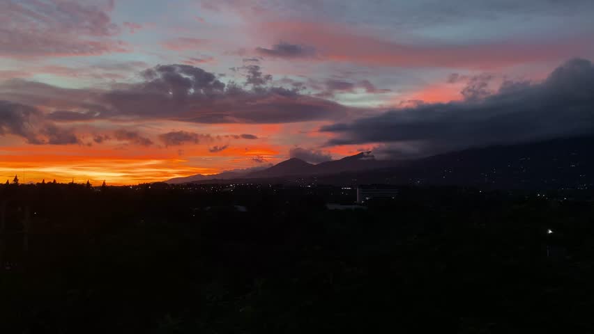  Fiery Sunset over the Mountains Dramatic Sky and Silhouette Landscape.
