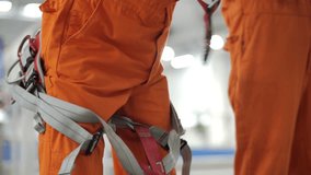 Rescuer Alpinist Adjusting Safety Harness - Powered by Shutterstock - Get 15% off with code: PIKWIZARD15