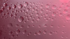A vibrant macro shot of perfect, round water droplets or condensation beading on a pink or magenta surface. The spherical drops reflect light, creating highlights and refractions  - Powered by Shutterstock - Get 15% off with code: PIKWIZARD15